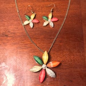 Necklace and earrings set with assorted stones.